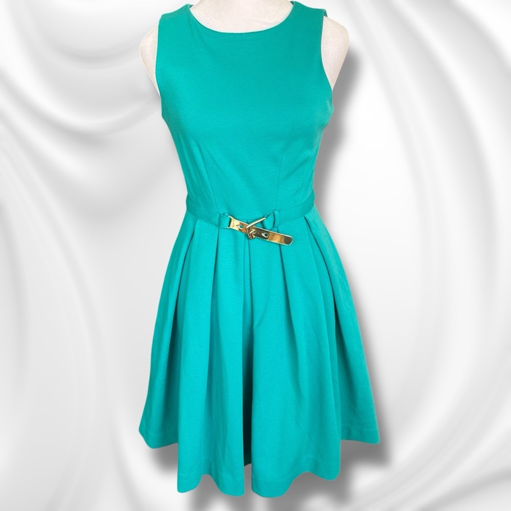 Jennifer Lopez Teal Sleeveless Dress With Pockets and Buckle - Picture 2 of 13